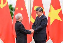 習(xí)近平同越共中央總書記阮富仲舉行會(huì)談|習(xí)近平：中越兩黨要堅(jiān)持為人民謀幸福、為人類謀進(jìn)步