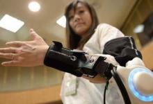 日本開發(fā)出機(jī)器人套裝 用意念操控